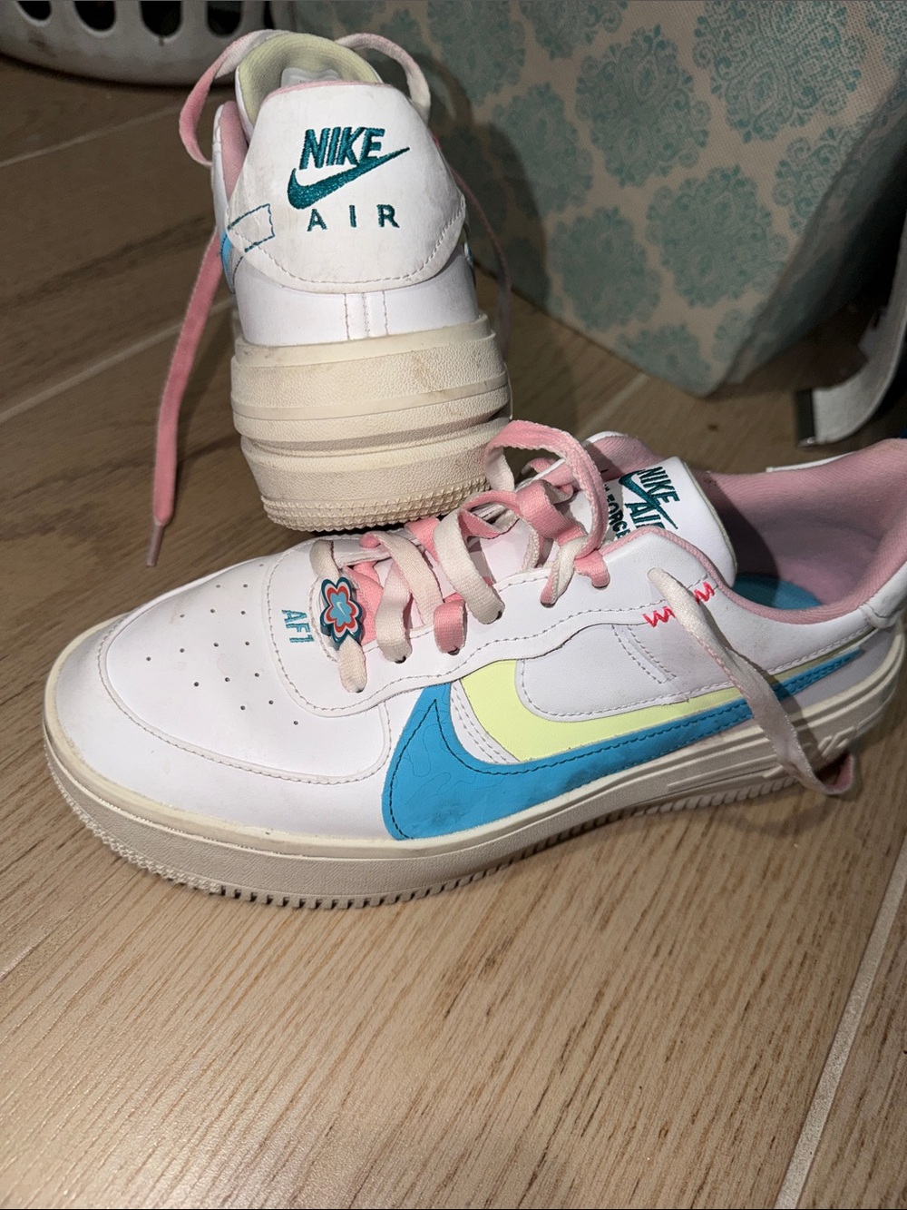 Nike Kids Sneakers in White with Blue, Yellow & Pink Accents